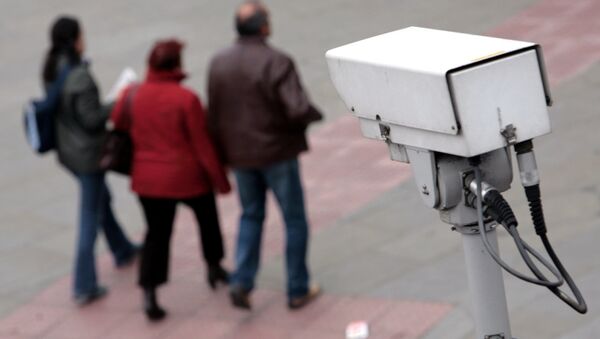 A police CCTV camera observes people walking in the Embankment area of central London. File photo - Sputnik International