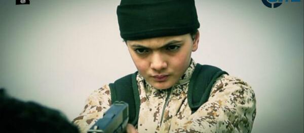 ISIL limitless immorality released a vid shows a child executing alleged Israeli spy Mohammad Ismail ISIL limitless immorality released a vid shows a child executing alleged Israeli spy Mohammad Ismail - Sputnik International