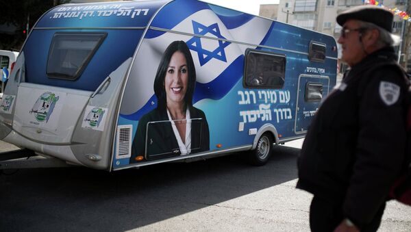 A portrait of Likud legislator Miri Regev is seen on a trailer, used for campaigning, during a stop in Netanya, north of Tel Aviv February 25, 2015 - Sputnik International