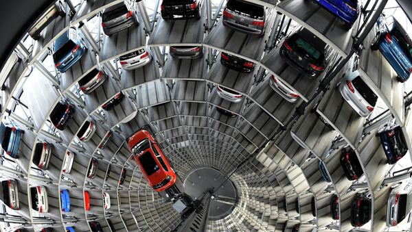 A VW Golf is pictured inside the so-called cat towers of car manufacturer Volkswagen AG (VW) at the company's assembly plant in Wolfsburg, northern Germany - Sputnik International