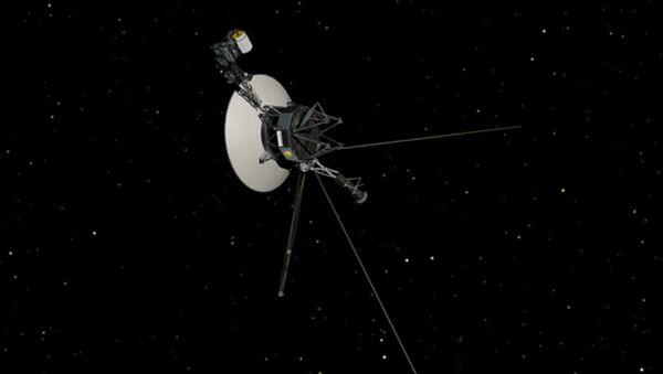 This artist's concept shows NASA's Voyager spacecraft against a backdrop of stars. - Sputnik International