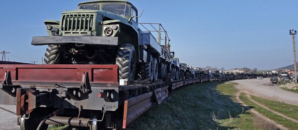 Military machinery prepared for shipment to Ukraine Military machinery prepared for shipment to Ukraine - Sputnik International