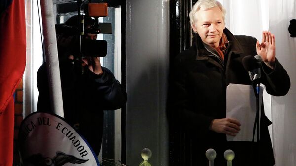 WikiLeaks founder Julian Assange gestures from the balcony of Ecuador's Embassy as he makes a speech in central London, in this file photograph dated December 20, 2012 - Sputnik International