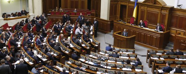 Members of the Ukrainian parliament attend a session dedicated to a vote on the creation of a new National Guard force, in Kiev, on March 13, 2014 - Sputnik International