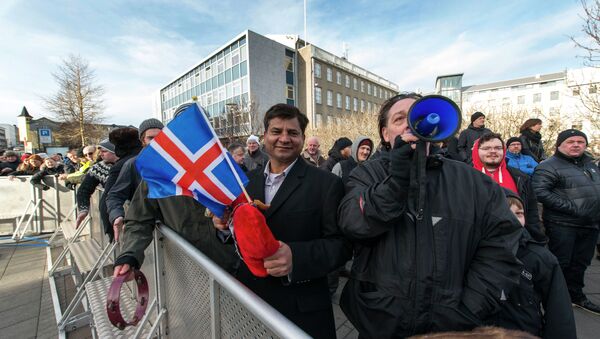 Thousands of protesters gather in front of teh Parliament in the Icelandic capital Reykjavik on February 24, 2014 - Sputnik International