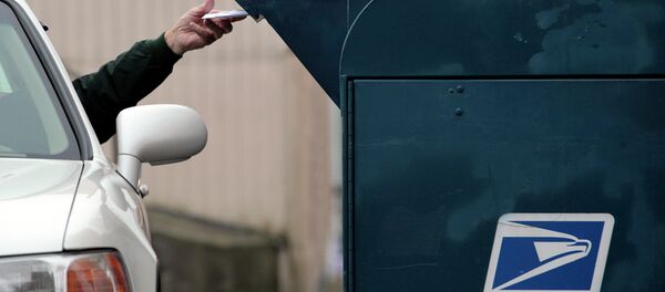 After reporters discovered a hidden camera outside of a Denver-area post office, it was quickly, quietly, and unexplainably removed. - Sputnik International