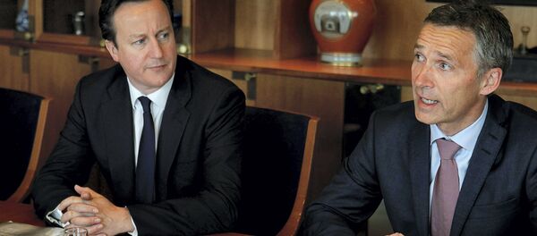 British Prime Minister David Cameron (L) listens to his Norwegian counterpart Jens Stoltenberg British Prime Minister David Cameron (L) listens to his Norwegian counterpart Jens Stoltenberg - Sputnik International