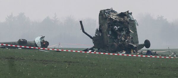 The wreckage of a military helicopter is pictured at the crash site near Belgrade airport, March 14, 2015 - Sputnik International