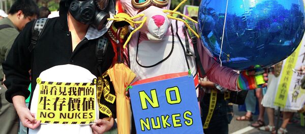 Demonstrators wearing costumes take part in an anti-nuclear protest in Taipei March 14, 2015 Demonstrators wearing costumes take part in an anti-nuclear protest in Taipei March 14, 2015 - Sputnik International
