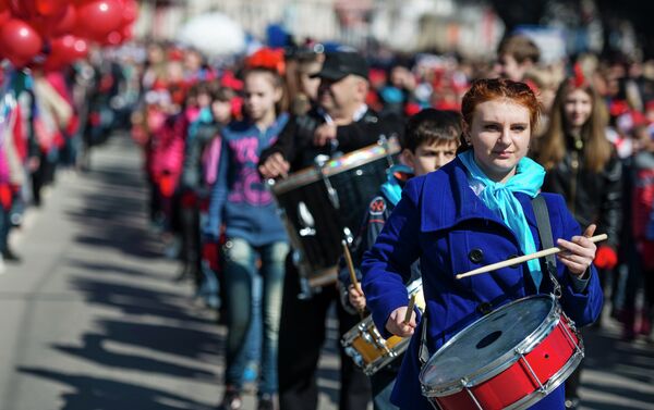 Participants of the Crimean Spring anniversary celebrations march through downtown Simferopol - Sputnik International