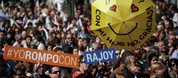 Pro-life demonstrators gather holding signs against abortion and waving flags in central Madrid March 14, 2015 Pro-life demonstrators gather holding signs against abortion and waving flags in central Madrid March 14, 2015 - Sputnik International