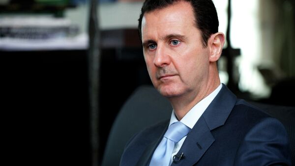 Syrian President Bashar al-Assad giving an interview. File photo - Sputnik International
