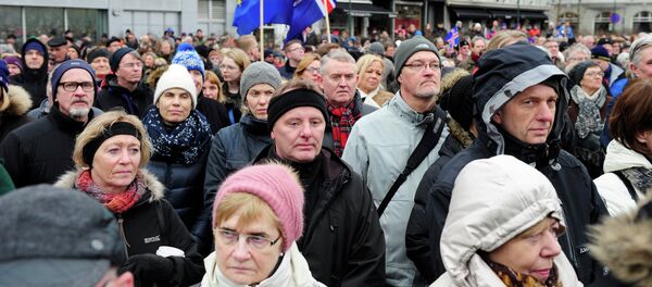 People rally during a protest against the Icelandic government's decision not to start negotiations with the European Union about joining the bloc, in Reykjavik People rally during a protest against the Icelandic government's decision not to start negotiations with the European Union about joining the bloc, in Reykjavik - Sputnik International