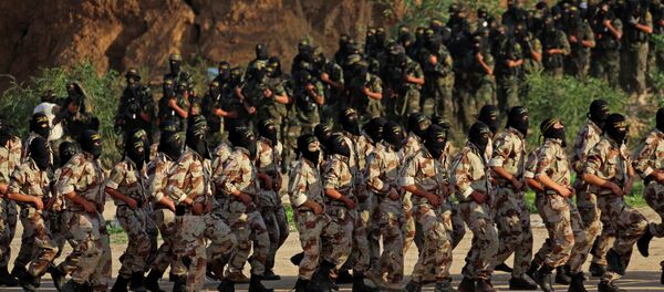 Palestinian militants of the Islamic Jihad group march during their military exercises - Sputnik International