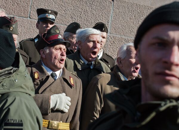 The annual procession commemorating the Latvian Waffen-SS (Schutzstaffel) unit, also known as the Legionnaires, in Riga March 16, 2015. The annual procession commemorating the Latvian Waffen-SS (Schutzstaffel) unit, also known as the Legionnaires, in Riga March 16, 2015. - Sputnik International