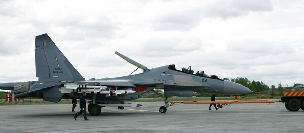 Wheeling out SU-30MKM plane manufactured by order from the Malaysian Air Force - Sputnik International