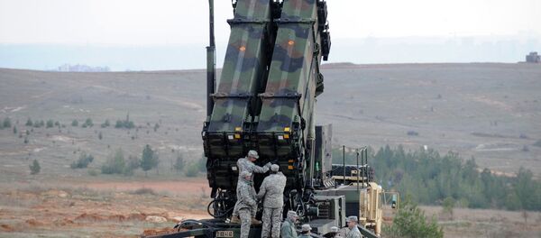 US soldiers work on a Patriot missile system US soldiers work on a Patriot missile system - Sputnik International