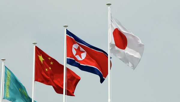 North Korean and South Korean Flags - Sputnik International