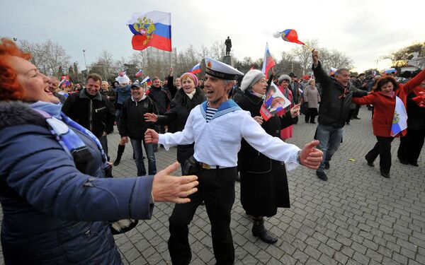 People dance in celebration of the results of the referendum on Crimea's status in Sevastopol, March 16, 2014.  - Sputnik International