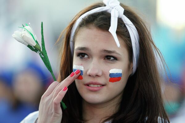 A girl with Russian national flags painted on her cheeks takes part in celebrations marking the one-year anniversary of Crimea voting to leave Ukraine, in central Simferopol March 16, 2015. A girl with Russian national flags painted on her cheeks takes part in celebrations marking the one-year anniversary of Crimea voting to leave Ukraine, in central Simferopol March 16, 2015. - Sputnik International