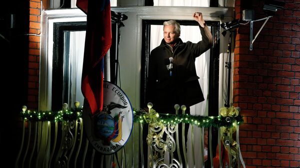 Julian Assange holds a press conference from a balcony at the Ecuadorian embassy in London on Dec. 20 2012 to mark six months since he first took refuge there on June 20 to avoid extradition to Sweden to faces sexual assault charges. - Sputnik International