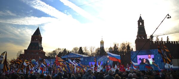 Rally and concert on Vasilyevsky Slope to mark anniversary of Crimea's reunification with Russia - Sputnik International