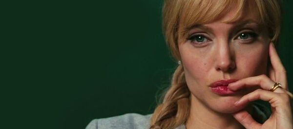 Angelina Jolie playing the role of Evely Salt, a CIA agent accused of being a Russian spy Angelina Jolie playing the role of Evely Salt, a CIA agent accused of being a Russian spy - Sputnik International