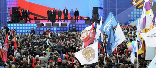 Russian President Vladimir Putin delivers a speech during a festive concert marking the first anniversary of the Crimean treaty signing in central Moscow Russian President Vladimir Putin delivers a speech during a festive concert marking the first anniversary of the Crimean treaty signing in central Moscow - Sputnik International
