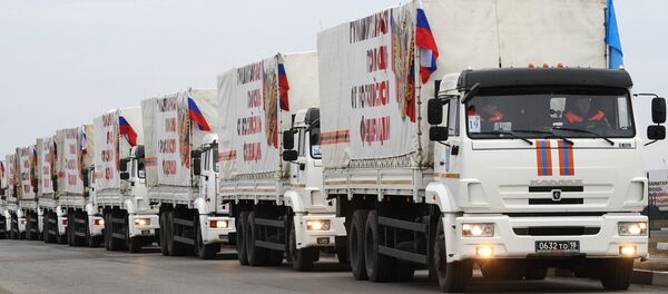 The trucks from the next column of Emercom of Russia with humanitarian aid for inhabitants of Donbass on the Matveev Kurgan check point in the Rostov region The trucks from the next column of Emercom of Russia with humanitarian aid for inhabitants of Donbass on the Matveev Kurgan check point in the Rostov region - Sputnik International