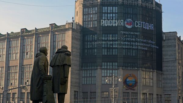 Media facade of MIA Russia Today on Tverskaya Street - Sputnik International