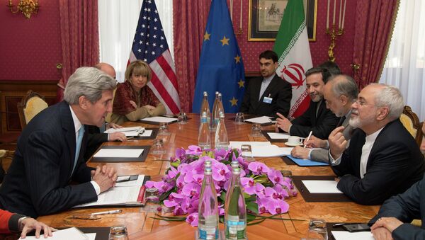 U.S. Secretary of State John Kerry holds a meeting with Iran's Foreign Minister Mohammad Javad Zarif over Iran's nuclear program, in Lausanne, Switzerland, Wednesday March 18. - Sputnik International