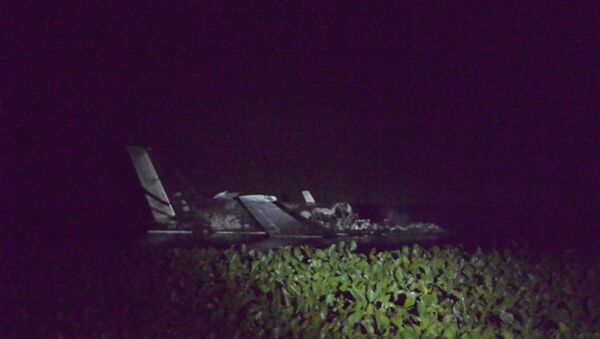 The wreckage of the Argentine twin-engine Beechcraft aircraft that crashed shortly after taking off from the Laguna del Sauce airport - Sputnik International