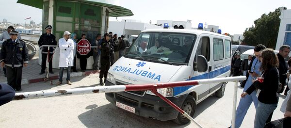 An ambulance arrives at the morgue carrying the body of a victim of Wednesday's attack on the national museum in Tunisia, in Tunis March 19, 2015 An ambulance arrives at the morgue carrying the body of a victim of Wednesday's attack on the national museum in Tunisia, in Tunis March 19, 2015 - Sputnik International