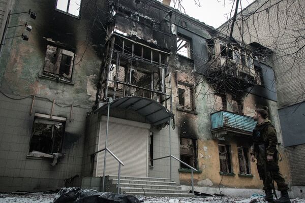 An apartment building in Debaltsevo destroyed by shelling. File photo An apartment building in Debaltsevo destroyed by shelling. File photo - Sputnik International