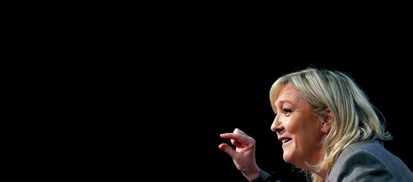 France's far-right National Front political party leader Marine Le Pen delivers a speech during a political rally in Six-Fours, near Toulon South Eastern France, March 16, 2015 France's far-right National Front political party leader Marine Le Pen delivers a speech during a political rally in Six-Fours, near Toulon South Eastern France, March 16, 2015 - Sputnik International