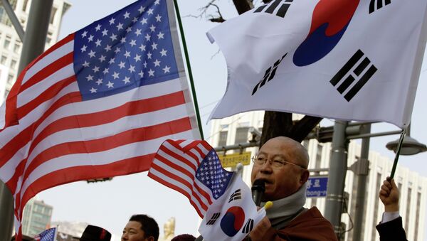 A South Korean Buddhist monk speaks during a rally wishing for a quick recovery of injured U.S. Ambassador Mark Lippert near the U.S. Embassy in Seoul, South Korea - Sputnik International