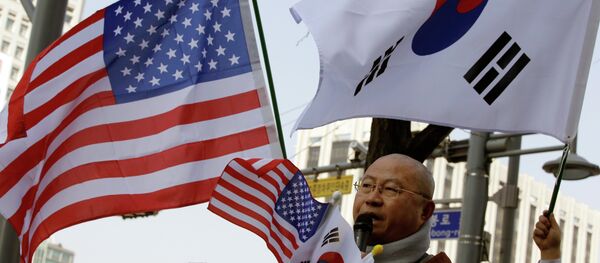 A South Korean Buddhist monk speaks during a rally wishing for a quick recovery of injured U.S. Ambassador Mark Lippert near the U.S. Embassy in Seoul, South Korea A South Korean Buddhist monk speaks during a rally wishing for a quick recovery of injured U.S. Ambassador Mark Lippert near the U.S. Embassy in Seoul, South Korea - Sputnik International