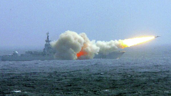 A destroyer of the South China Sea Fleet of the Chinese Navy fires a missile during a training exercise. - Sputnik International