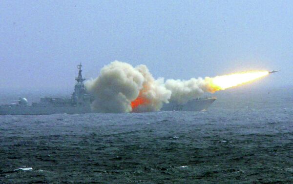 A destroyer of the South China Sea Fleet of the Chinese Navy fires a missile during a training exercise. - Sputnik International