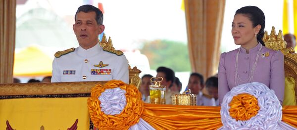 Thai Crown Prince Maha Vajiralongkorn (L) and Princess Srirasmi (R) attend the annual Royal Ploughing Ceremony at Sanam Luang in Bangkok on May 13, 2010 - Sputnik International