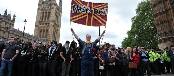 Unite Against Fascism (UAF) supporters protest during a demonstration against the British National Party (BNP) in central London. File photo Unite Against Fascism (UAF) supporters protest during a demonstration against the British National Party (BNP) in central London. File photo - Sputnik International