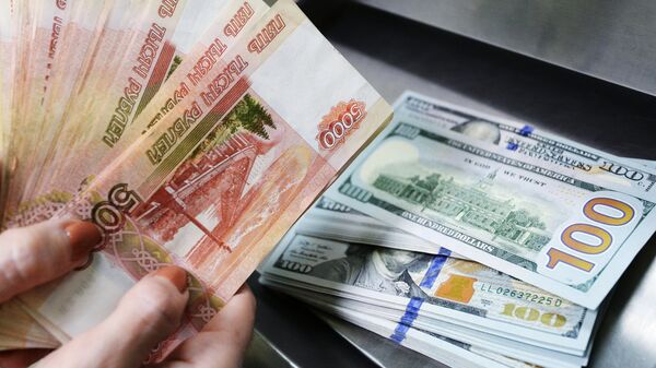 US dollars and rubles inside a currency exchange office of a Sberbank - Sputnik International