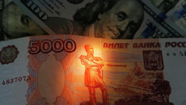 Banknotes of US dollars and rubles - Sputnik International