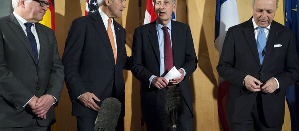 German Foreign Minister Frank Walter Steinmeier (L), U.S. Secretary of State John Kerry (2nd L), British Foreign Secretary Philip Hammond and French Foreign Minister Laurent Fabius (R) talk after Secretary Hammond made a statement about their meeting regarding recent negotiations with Iran over Iran's nuclear program in London, England March 21, 2015 German Foreign Minister Frank Walter Steinmeier (L), U.S. Secretary of State John Kerry (2nd L), British Foreign Secretary Philip Hammond and French Foreign Minister Laurent Fabius (R) talk after Secretary Hammond made a statement about their meeting regarding recent negotiations with Iran over Iran's nuclear program in London, England March 21, 2015 - Sputnik International