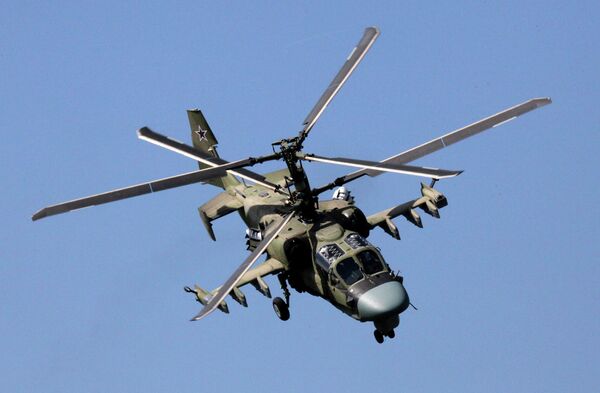 A KA-52 Alligator helicopter in a demo flight during the celebration of the Progress aviation plant's 75th anniversary A KA-52 Alligator helicopter in a demo flight during the celebration of the Progress aviation plant's 75th anniversary - Sputnik International