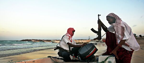 Somali pirates carrying out preparations to a skiff in Hobyo, northeastern Somalia. File photo - Sputnik International