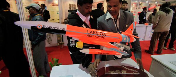 An Indian delegate displays a model of Lakshya, remotely piloted high speed target drone system developed by the Indian Defense Research and Development Organization (DRDO), at the 101st Indian Science Congress in Jammu, India An Indian delegate displays a model of Lakshya, remotely piloted high speed target drone system developed by the Indian Defense Research and Development Organization (DRDO), at the 101st Indian Science Congress in Jammu, India - Sputnik International