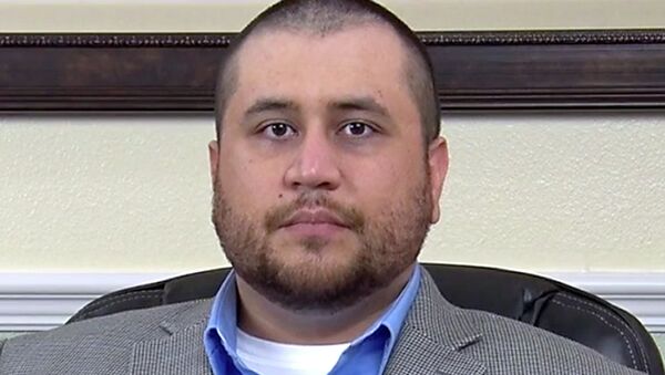 This image taken from a video released by attorney Howard Iken on Wednesday, March 12, 2014, shows George Zimmerman, the former neighborhood watch volunteer who was acquitted of murder for fatally shooting Trayvon Martin, during an interview in Orlando, Fla., on Friday, March 7, 2014 - Sputnik International