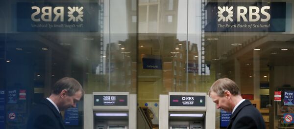 A pedestrian is reflected in an advertising board as he walks past a branch of The Royal Bank of Scotland in central London A pedestrian is reflected in an advertising board as he walks past a branch of The Royal Bank of Scotland in central London - Sputnik International