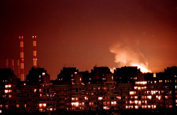 Flames from an explosion light up the Belgrade skyline near a power station after NATO cruise missiles and warplanes attacked Yugoslavia late Wednesday, March 24, 1999 Flames from an explosion light up the Belgrade skyline near a power station after NATO cruise missiles and warplanes attacked Yugoslavia late Wednesday, March 24, 1999 - Sputnik International